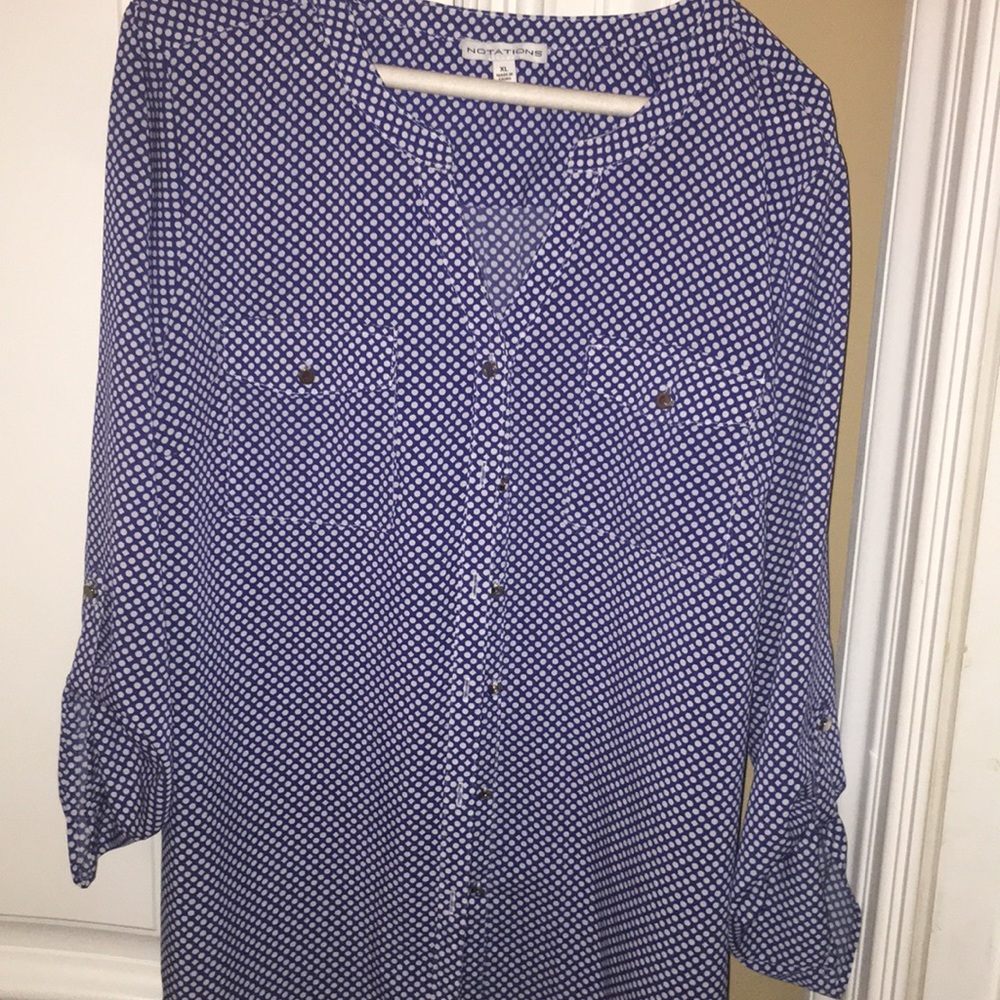 Blue long sleeve blouse with White polkadots.